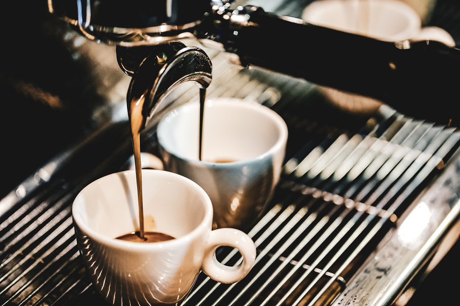 Espresso Machine Brewing A Coffee. Coffee Pouring Into Glasses I